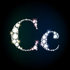 Sparkling diamond gemstone letter C