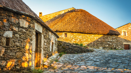 O Cebreiro, Spain. Historic stone huts at sunset