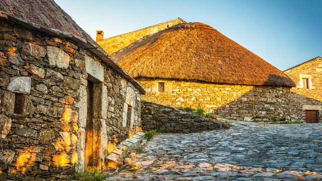 O Cebreiro, Spain. Historic stone huts at sunset