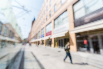 people walking on a city street