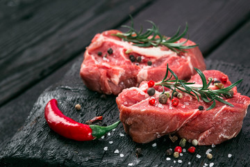 raw beef steak and spices