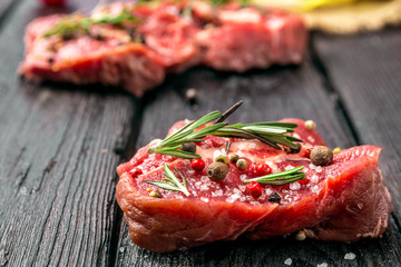 raw beef steak and spices