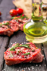 raw beef steak and spices
