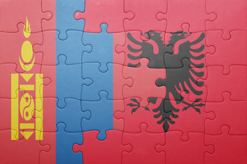 puzzle with the national flag of mongolia and albania