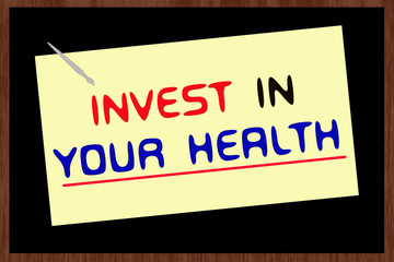 Invest in your health sign on blackboard background