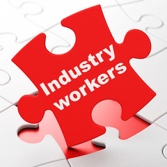 Industry concept: Industry Workers on puzzle background