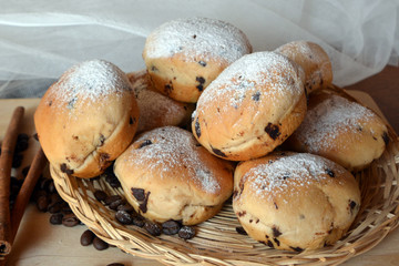 Freshly baked traditional buns with chocolate chips