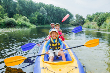 Family kayaking on the river - 108143574