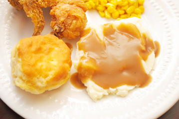 Mashed Potatoes & Gravy with a Biscuit Served as Side Dishes
