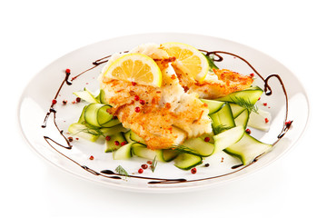 Fish dish - fried cod fillet and vegetables 