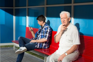 Men waiting for bus