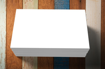 stack of white blank name card on wooden background