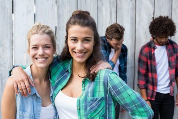 Portrait of women embracing each other