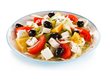 Greek salad on white background