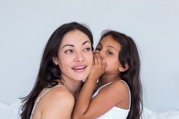 Woman relaxing with her daughter