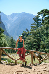 Fototapeta na wymiar hiker woman resting in Crete mountain