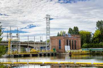 Obraz premium Hydroelectric Plant and Cloudy Sky