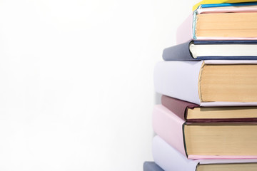 Stack of books on white background