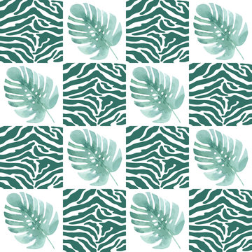 Seamless pattern with tropical leaves on the texture of the skin