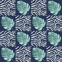 Seamless pattern with tropical leaves on the texture of the skin