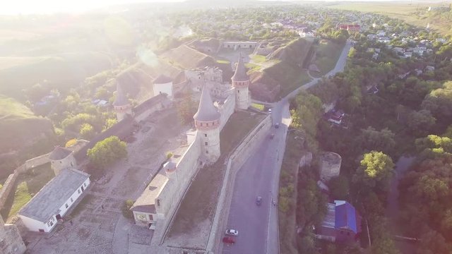 Aerial view Flying camera over of the old castle. Ukrine. aLviv. Pidgirtsi. Travel tourism adventure in wild nature camera bird eye view.
