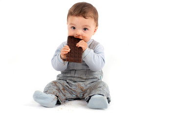 Baby eating chocolate