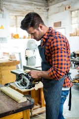 Carpenter working on his craft