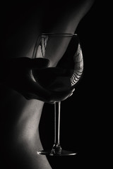 Fototapeta premium glass of wine and the sexy body