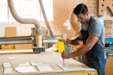 Carpenter working on his craft