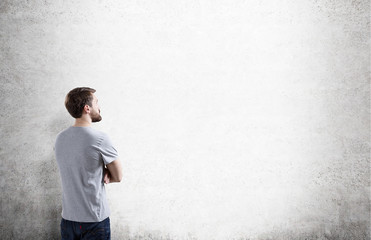 Man looking at wall