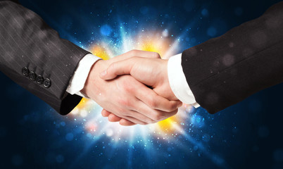 Two business men shaking hands