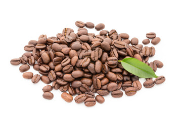 Coffee grains and leaves isolated on the white backgrounds.