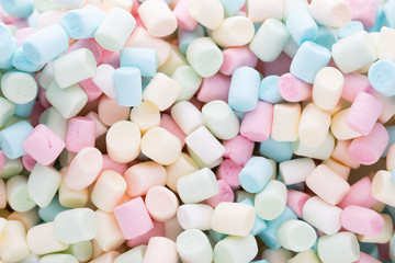 Background or texture of colorful mini marshmallows.