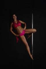 Woman performing pole dance