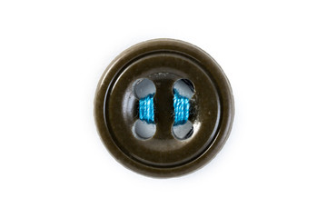 button with blue thread on white background