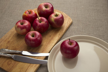 Red apples on a table