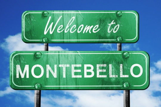 montebello vintage green road sign with blue sky background
