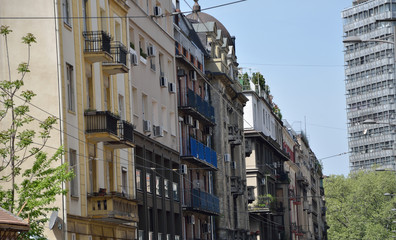 Facades of old and modern buildings downtown