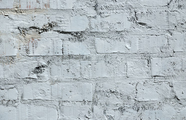 Colored brick wall with harsh surface as background
