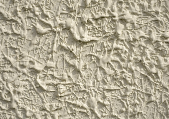textured surface with white plastic paint