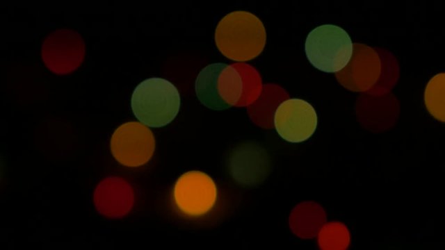 Background colorful dot Christmas lights defocused blinking 4K 2160p 30fps UHD video - Blinking in dark multi-color decorative dot lights 4K 3840X2160 UltraHD footage 