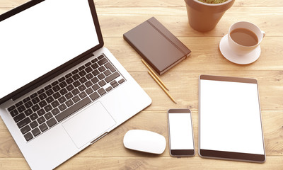 Obraz na płótnie Canvas Laptop and gadgets on table
