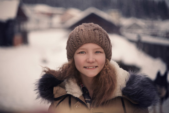 Portrait of girl in woolly hat