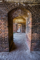 Standing on the moat which surrounds Fort Jefferson Civil War Fort and a prison for confederate soldiers