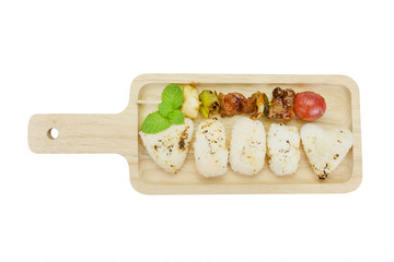skewer of mixed meat and vegetables with grilled rice,clipping path