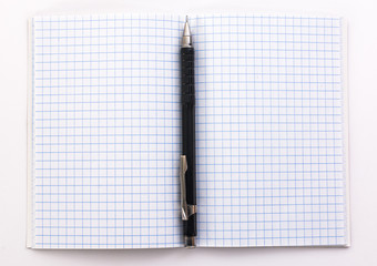notebook with pencil