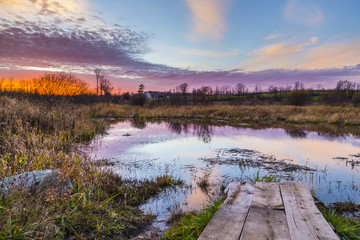 colorful rural sunset scene in late autumn