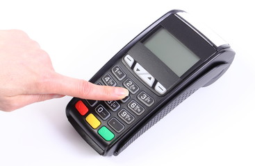 Using payment terminal, cashless paying for shopping, enter personal identification number