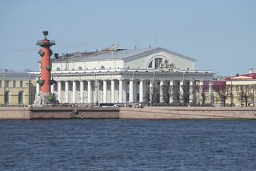 South Rostral column and stock exchange building on the Spit of Vasilievsky island sunny may day. St. Petersburg