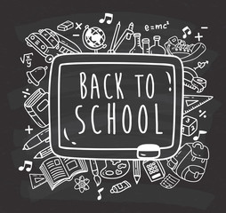Fototapeta na wymiar Back to school themed doodle on chalkboard background
